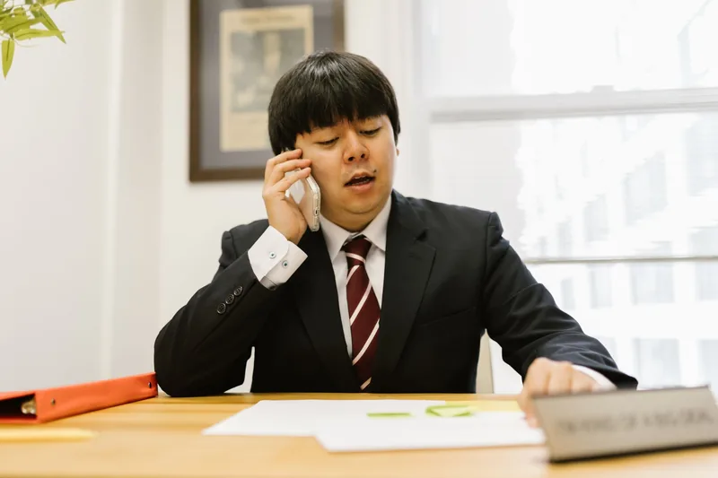 Sales professional following up with a prospect by phone