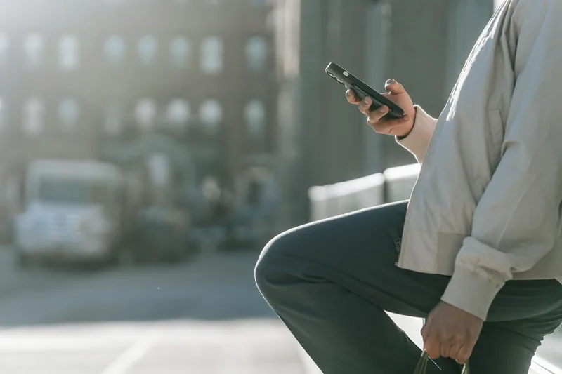 Person searching for a local business on their smartphone
