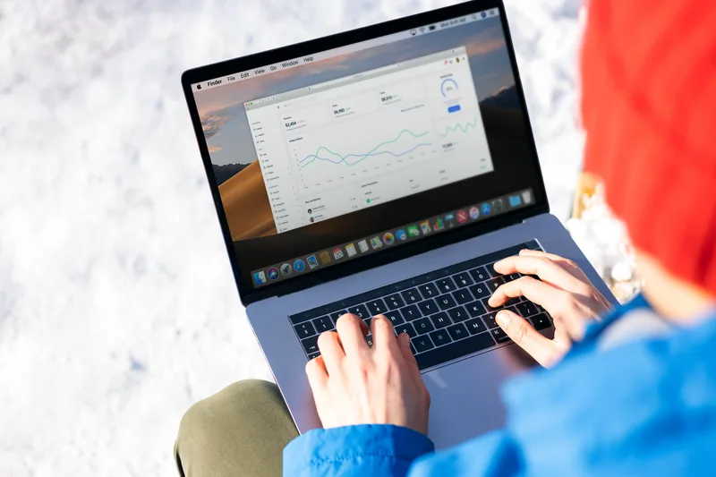 Reviewing lead activity on a laptop dashboard