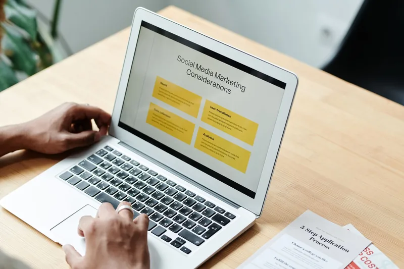 A WordPress content management dashboard on a laptop screen